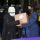 AOC giving away boxes of food in her home district of Queens, New York, last fall